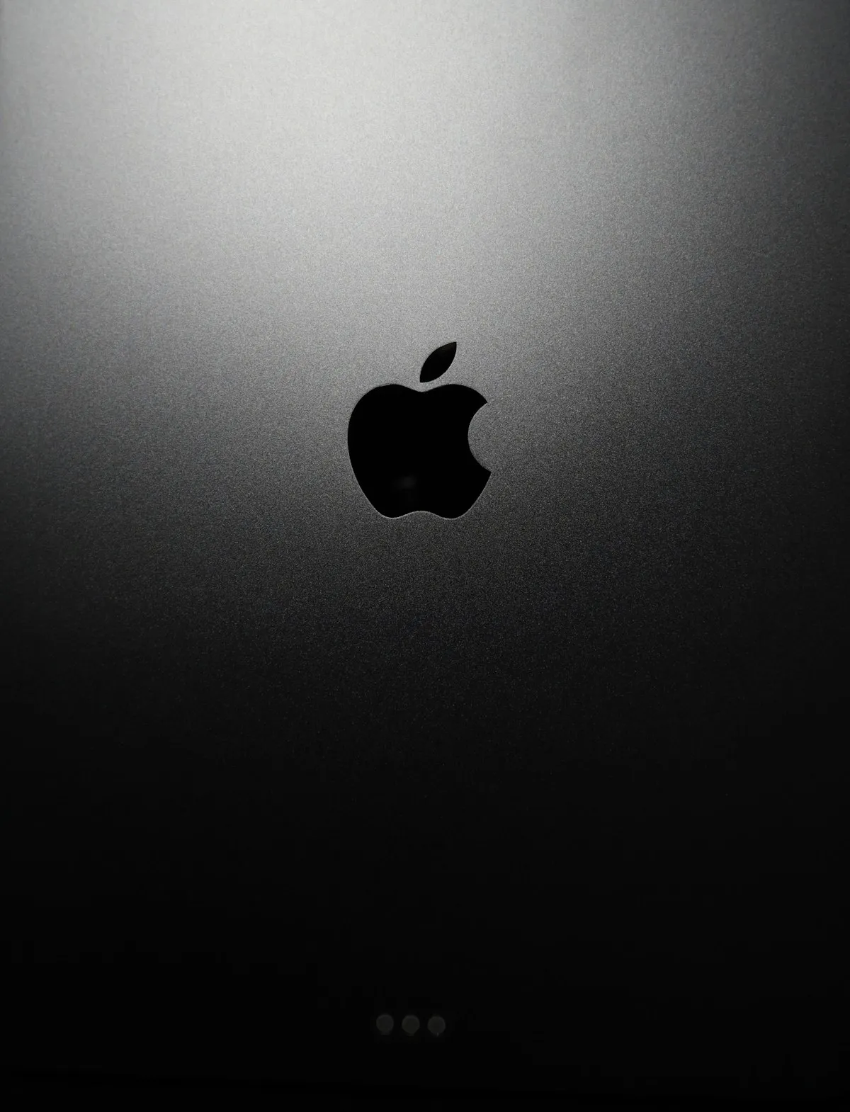 Apple M5 processor chip architecture with dual-die system on black background